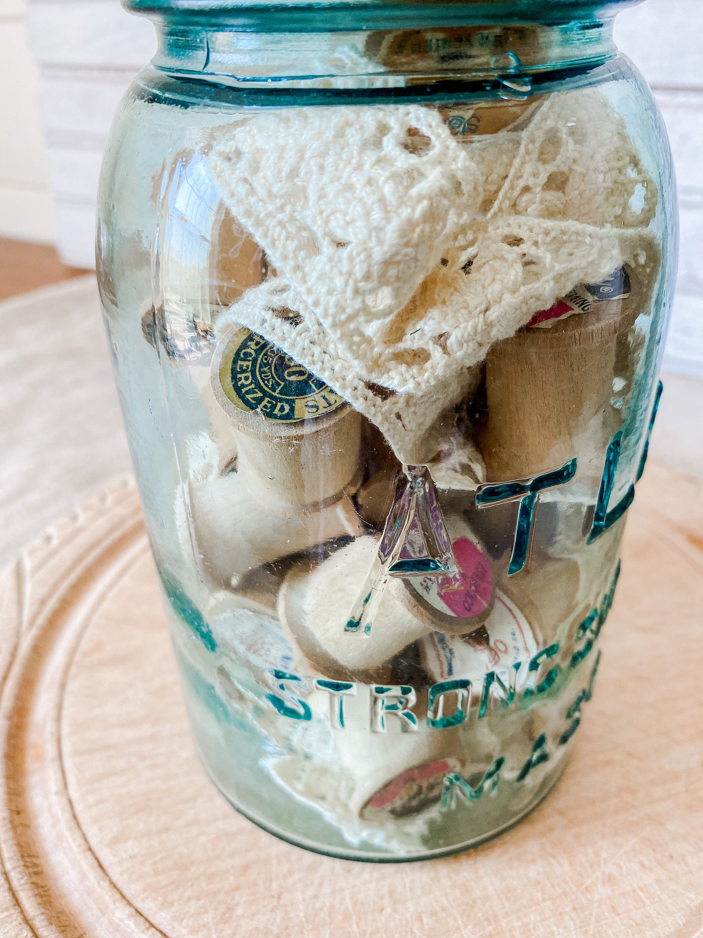 Antique Glass Canning Jar with Spools and Lace | Atlas Strong Shoulder Blue Quart Jar with Zinc Porcelain Screw Top Lid | Instant Collection