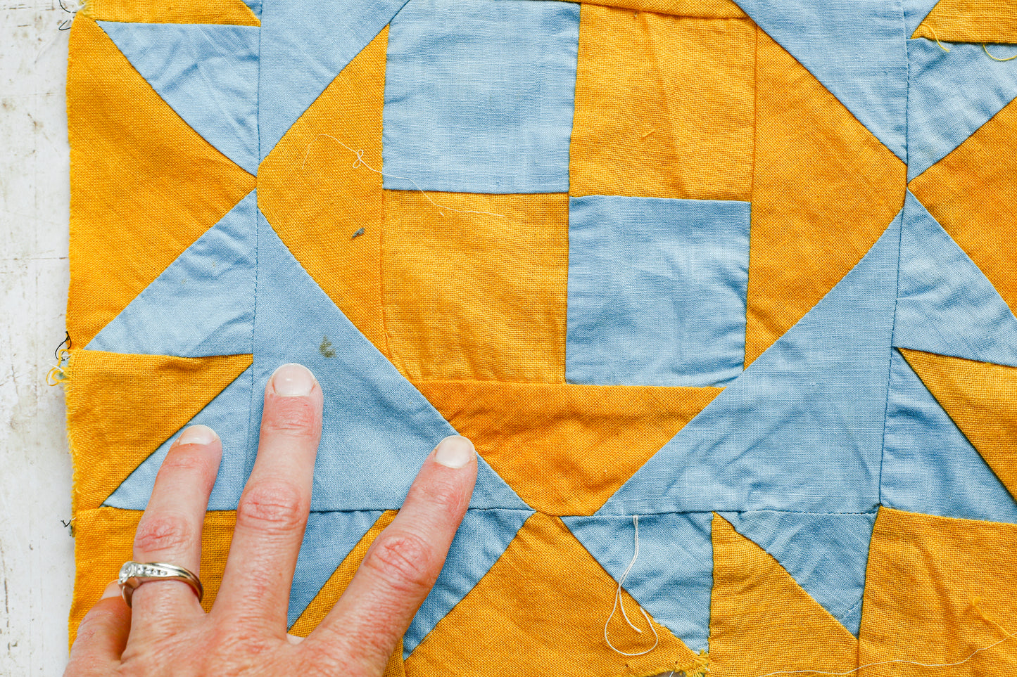 Vintage Set of 21 Orange & Blue Crow’s Foot Quilt Blocks, c1930