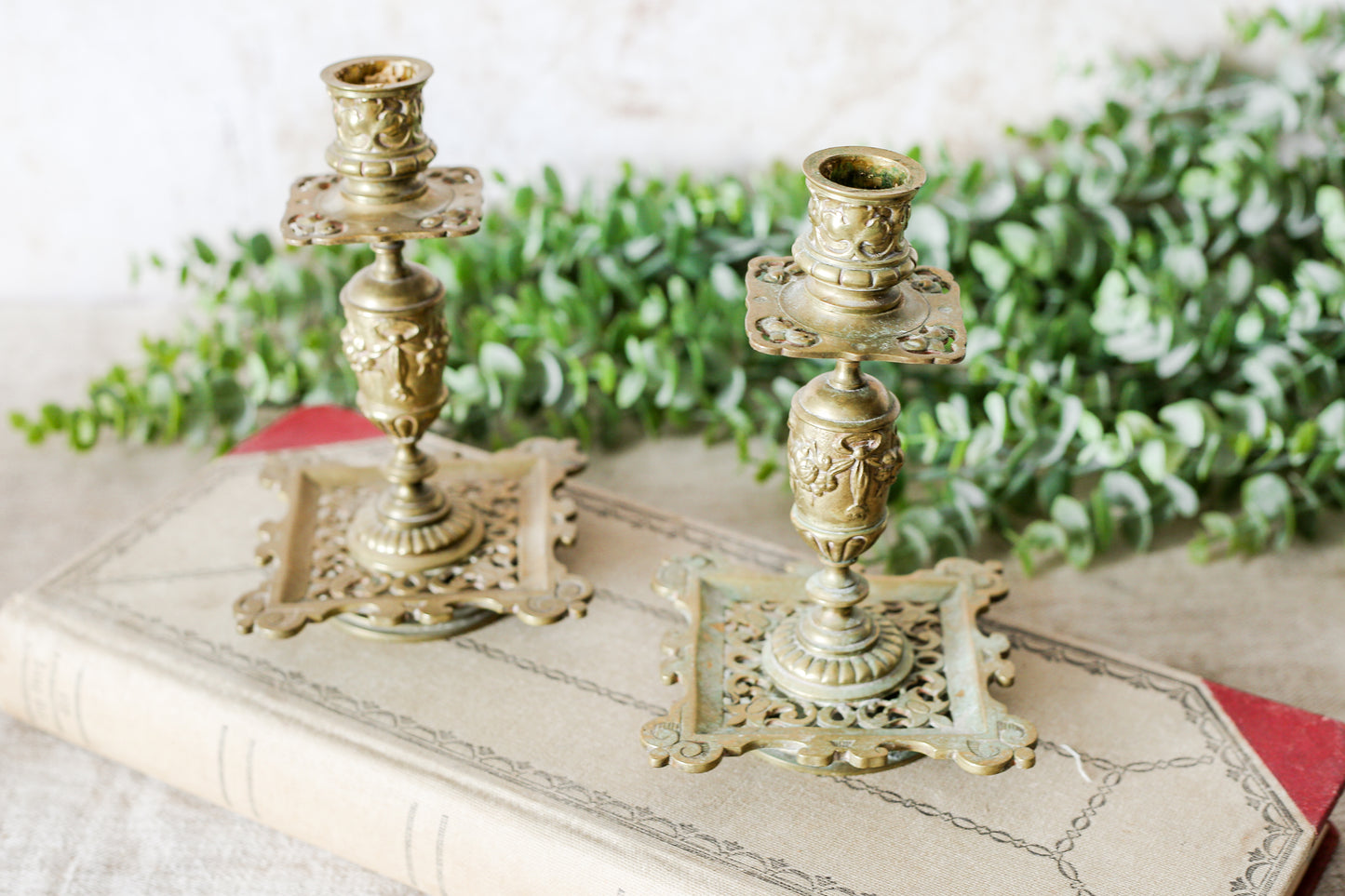 Antique Pair of French-Style Brass Candlesticks with Reticulated Bases