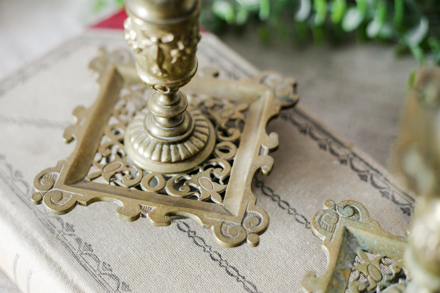 Antique Pair of French-Style Brass Candlesticks with Reticulated Bases