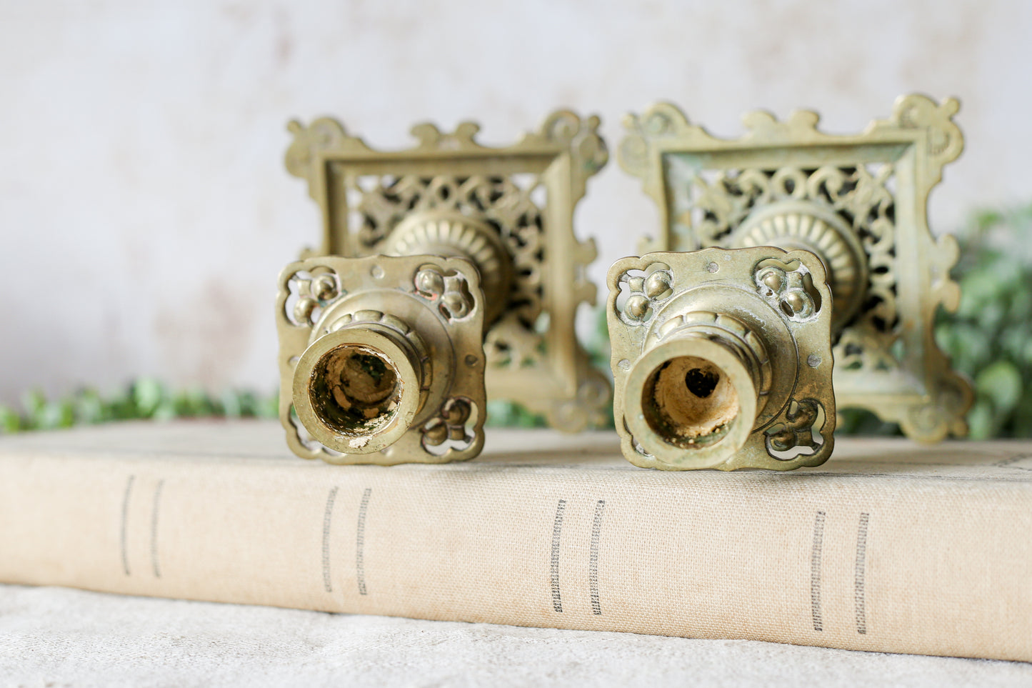 Antique Pair of French-Style Brass Candlesticks with Reticulated Bases