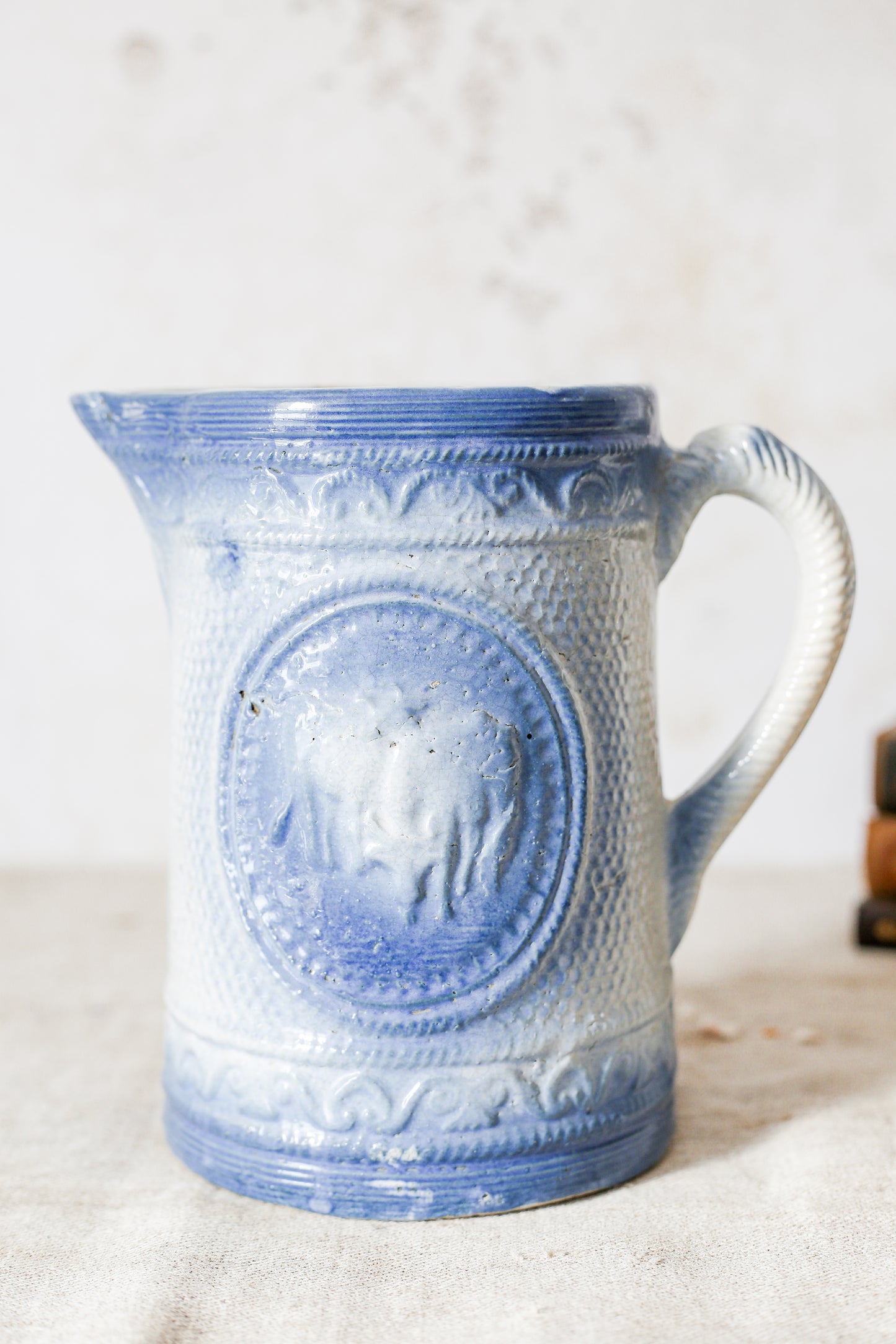 Antique Blue Salt Glaze Pitcher with Cows