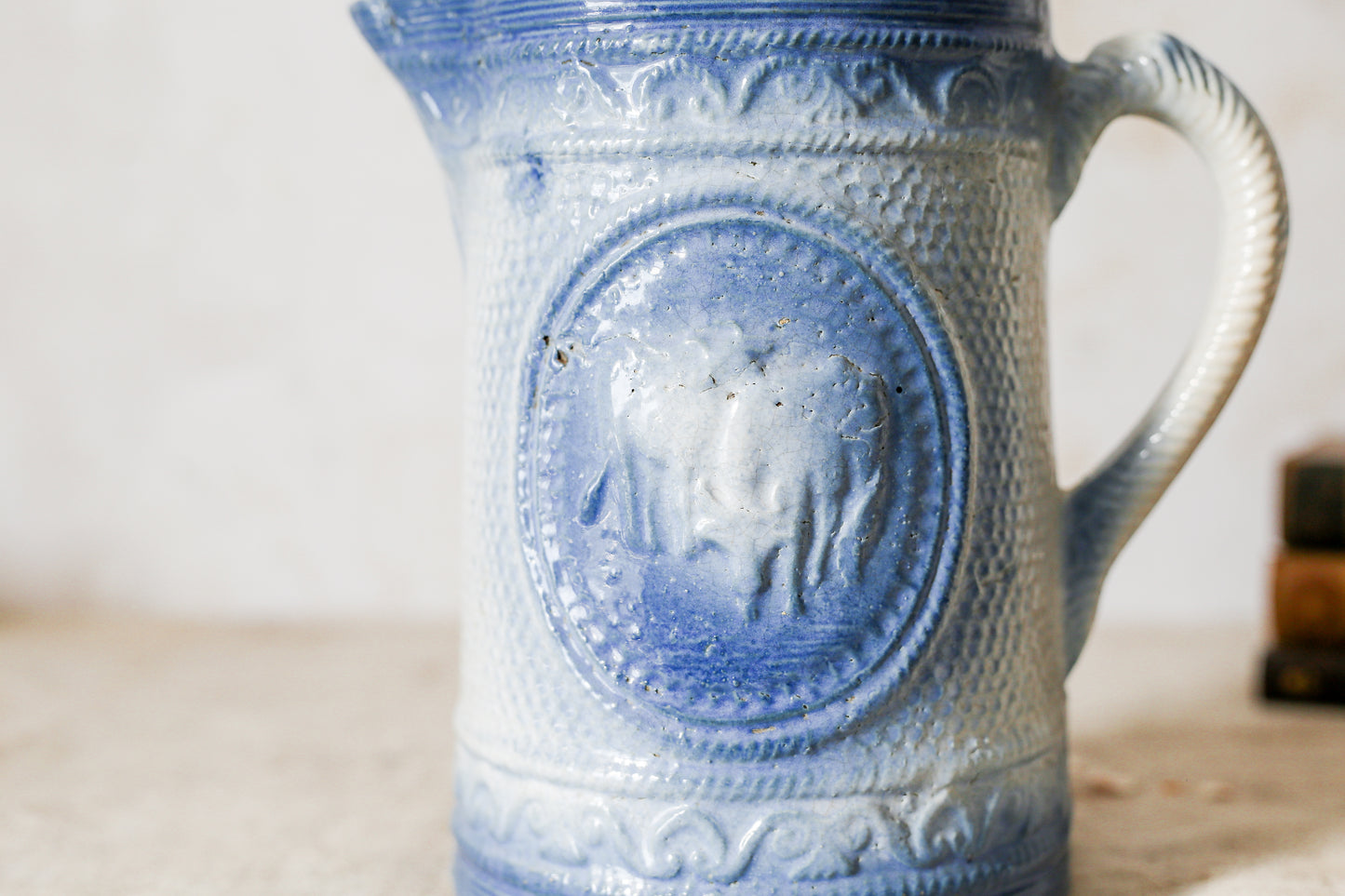 Antique Blue Salt Glaze Pitcher with Cows