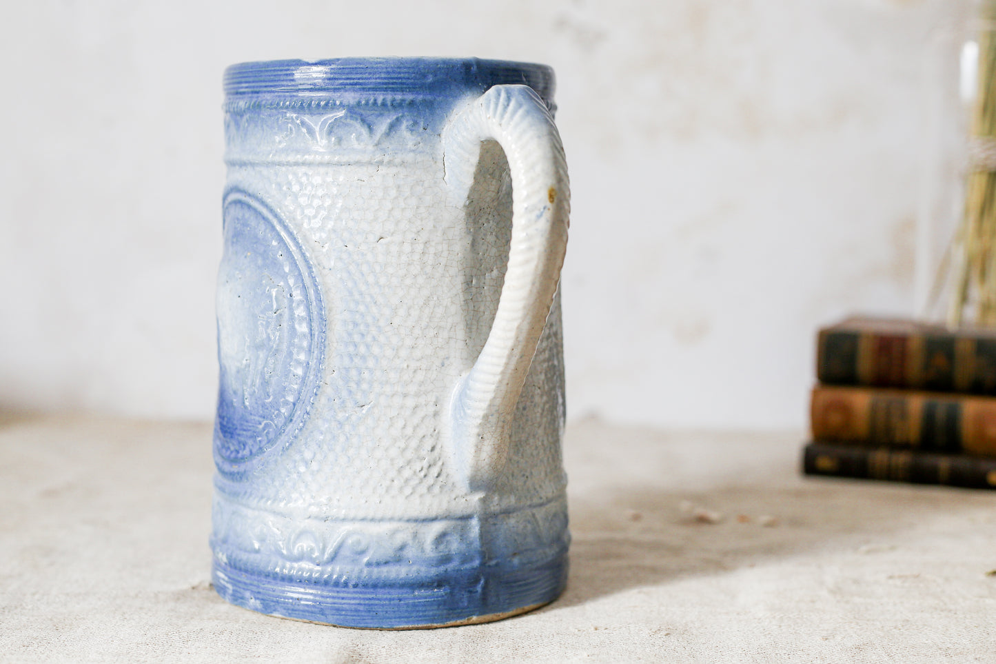 Antique Blue Salt Glaze Pitcher with Cows