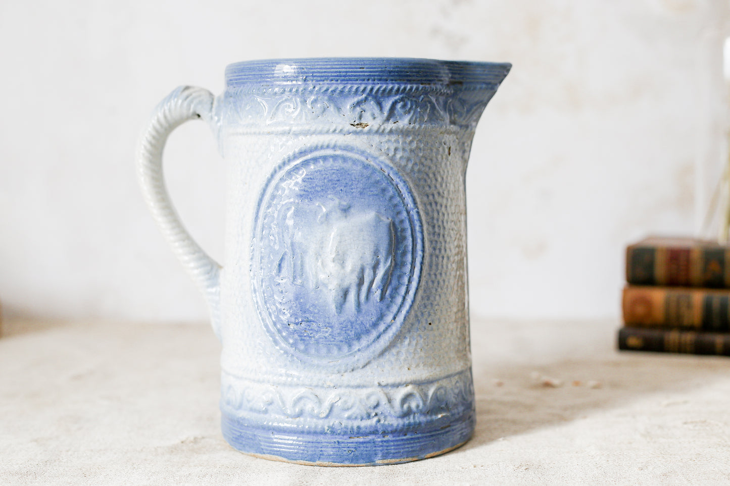 Antique Blue Salt Glaze Pitcher with Cows