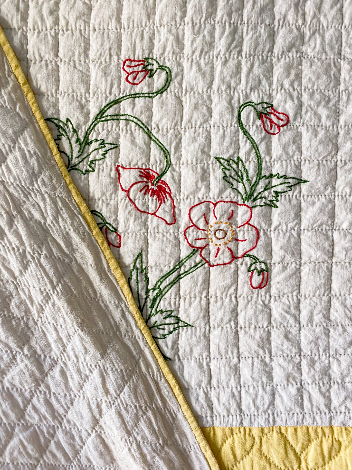 Vintage Yellow and White Quilt with Red Embroidered Flowers
