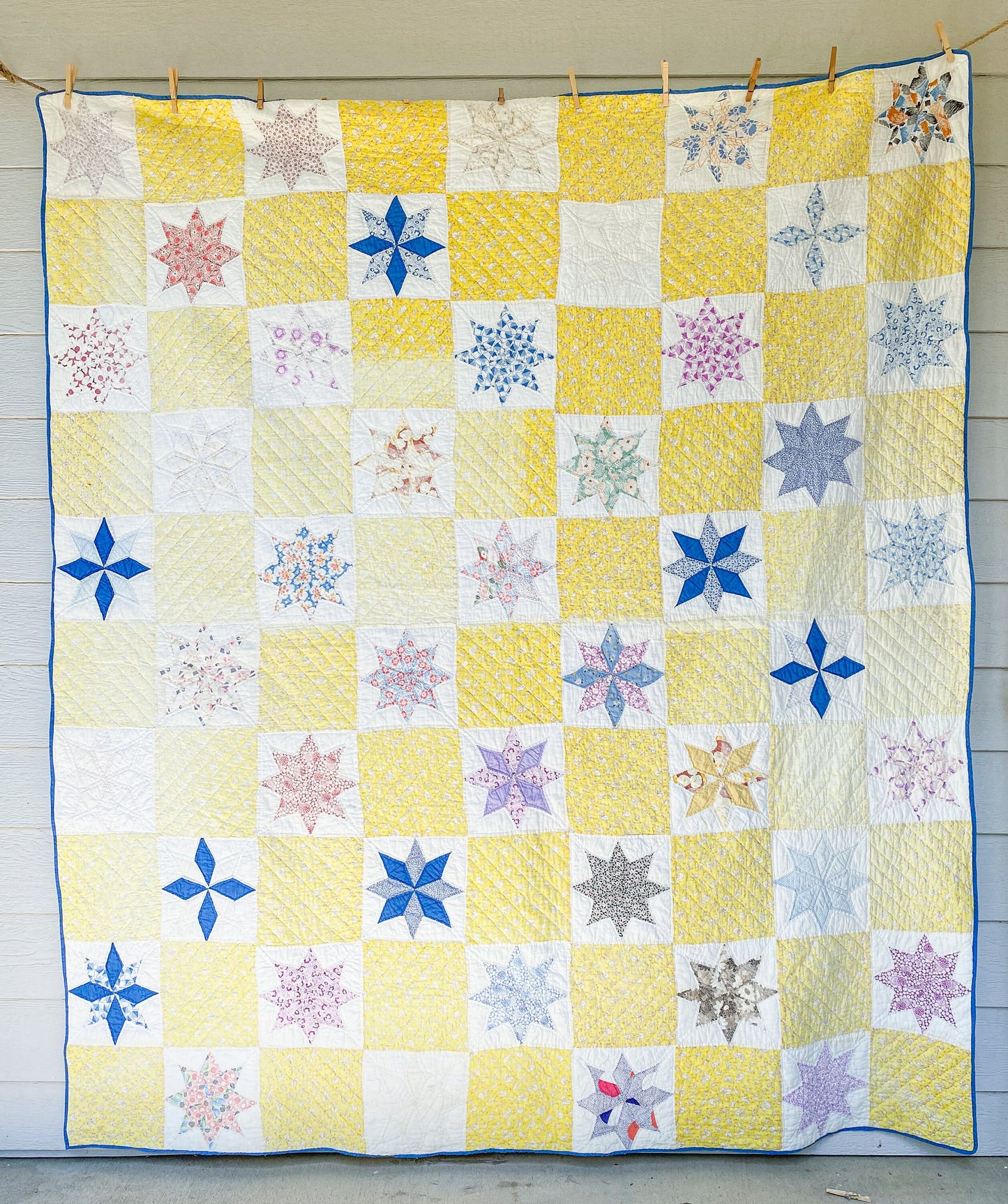 Vintage Yellow and Blue Eight Point Star Quilt, c1950s, 79" x 76"